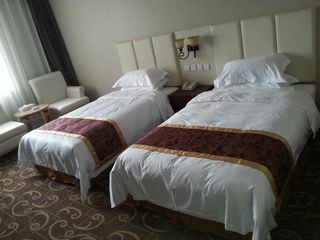 Фото отеля Xinxiang Zhongzhou Yihe Hotel