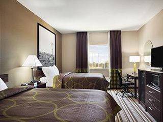 Фото отеля SureStay Plus Hotel by Best Western Owasso Tulsa North