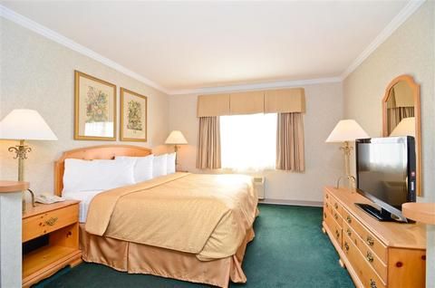 Photo of Magnuson Grand Pioneer Inn and Suites