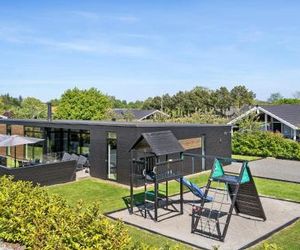 Four-Bedroom Holiday home with a Fireplace in Juelsminde Sonderby Denmark