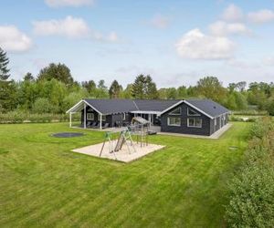 Eight-Bedroom Holiday home with a Fireplace in Glesborg Fjellerup Denmark