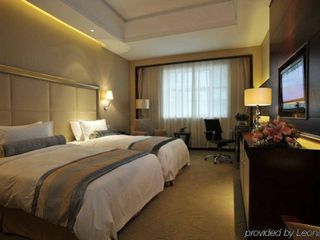 Фото отеля Changzhou Olympic Mingdu International Hotel