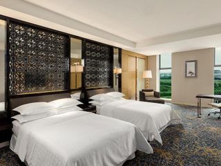 Фото отеля Sheraton Changchun Jingyuetan Hotel