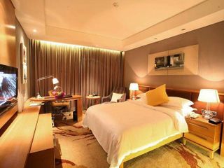 Фото отеля Ganzhou Gandian Hotel