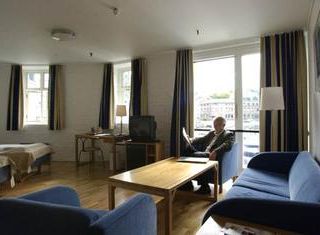 Фото отеля Hotel Brosundet, an Ascend Hotel Collection Member