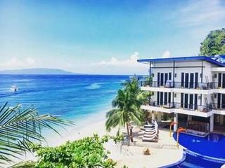 Фото отеля Sunset at Aninuan Beach Resort